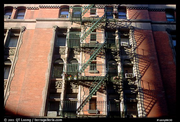 Emergency exit staircases on the side of a building. NYC, New York, USA