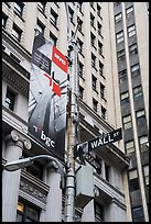Street signs at the intersection of Wall Street and Nassau Street. NYC, New York, USA ( color)