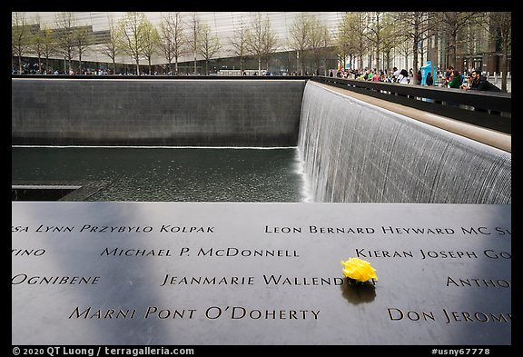 Names incribed on bronze parapets, waterfalls, National September 11 Memorial. NYC, New York, USA (color)