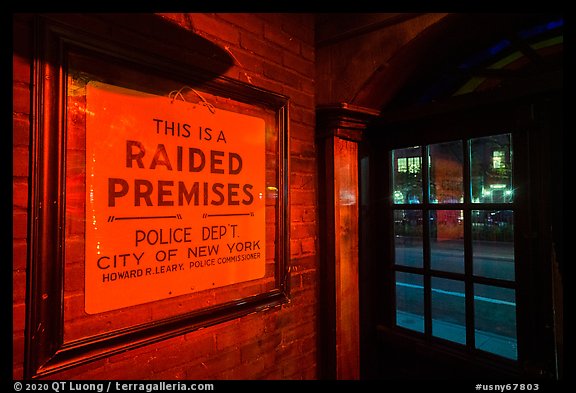 Raided Premises sign in Stonewall Inn, Stonewall National Monument. NYC, New York, USA (color)