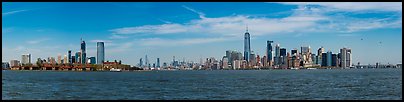 New York Harbor with Jersey City and Manhattan skylines. NYC, New York, USA (Panoramic color)