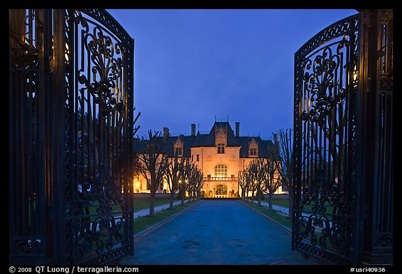 Entrance gate and historic mansion building at night. Newport, Rhode Island, USA