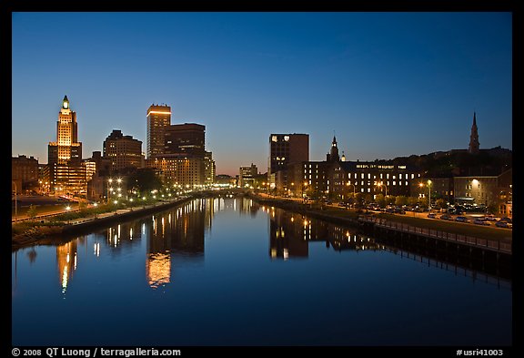 Wide view of downtown buildings reflected in Seekonk river at dusk. Providence, Rhode Island, USA