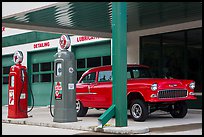 Vintage gas pumps and car, Deadwood. Black Hills, South Dakota, USA (color)