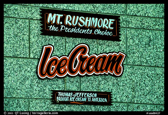 Sign about ice cream and presidents, Mount Rushmore National Memorial. South Dakota, USA (color)