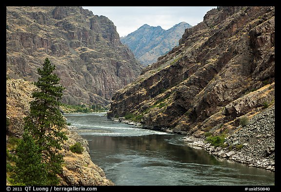 High cliffs above free-flowing part of Snake River. Hells Canyon National Recreation Area, Idaho and Oregon, USA (color)