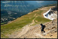 Hiker descending Table Mountain Trail. Jedediah Smith Wilderness,  Caribou-Targhee National Forest, Idaho, USA ( color)