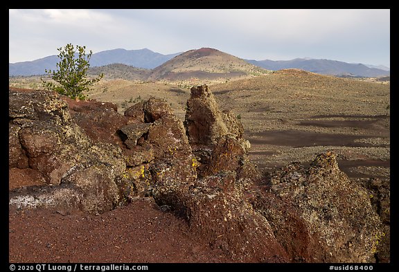 Colorful lava rocks of Echo Crater, Big Cinder Butte, and Pioneer Mountains. Craters of the Moon National Monument and Preserve, Idaho, USA