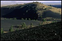 Slopes covered with hardened lava and cinder, Craters of the Moon National Monument. Idaho, USA (color)