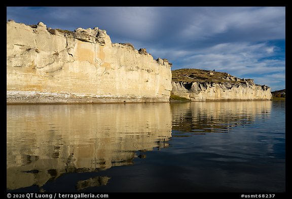 White cliffs dropping straight into river. Upper Missouri River Breaks National Monument, Montana, USA