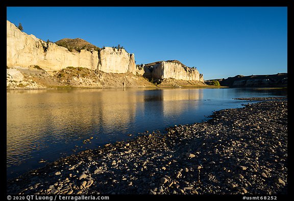 Sandstone white cliffs reflected in river. Upper Missouri River Breaks National Monument, Montana, USA (color)