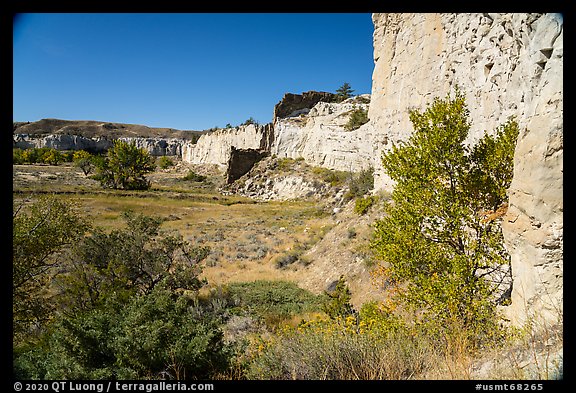 Sandstone cliffs surround native campsite. Upper Missouri River Breaks National Monument, Montana, USA