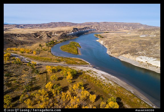 Aerial view of Cottonwoods and cliff near Slaughter River Camp. Upper Missouri River Breaks National Monument, Montana, USA