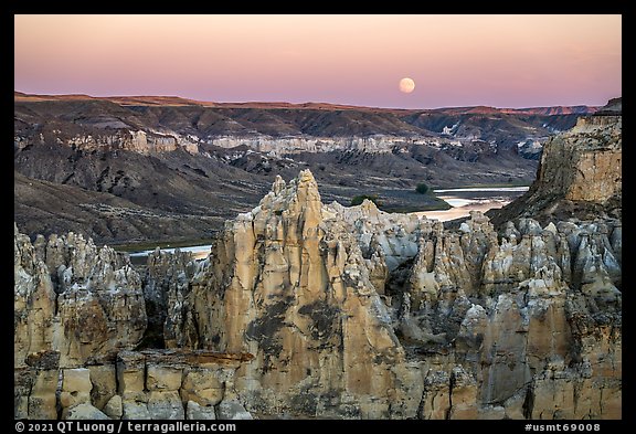 Spires, Missouri River, and moon, Hole-in-the-Wall. Upper Missouri River Breaks National Monument, Montana, USA (color)