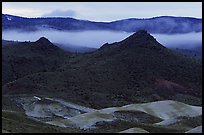 Buttes and fog at dusk. John Day Fossils Bed National Monument, Oregon, USA ( color)