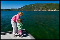 Mother and daughter on deck, East Lake. Newberry Volcanic National Monument, Oregon, USA ( color)