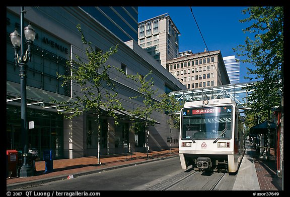 Street with tram, downtown. Portland, Oregon, USA (color)
