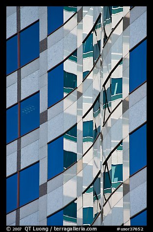 Pattern of windows and reflections in high rise building. Portland, Oregon, USA (color)