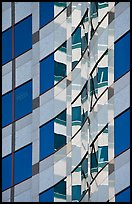Pattern of windows and reflections in high rise building. Portland, Oregon, USA