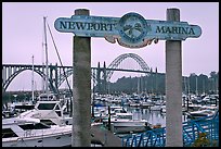 Newport marina and sign, foggy sunrise. Newport, Oregon, USA