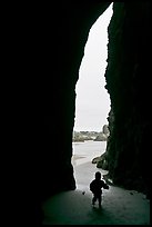 Infant and sea cave opening from inside. Bandon, Oregon, USA (color)