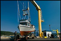Fishing boat lifted onto deck, Port Orford. Oregon, USA ( color)