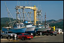 Fishing boats and cars parked on deck, Port Orford. Oregon, USA ( color)