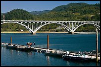 Small boat deck and Rogue River bridge. Oregon, USA (color)