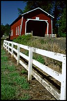 Fence and red covered bridge, Willamette Valley. Oregon, USA (color)