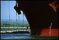 Cargo ship loading floated timber, Coos Bay. Oregon, USA (color)