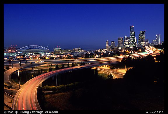 Seattle skyline, Qwest Field and freeways at dawn. Seattle, Washington (color)