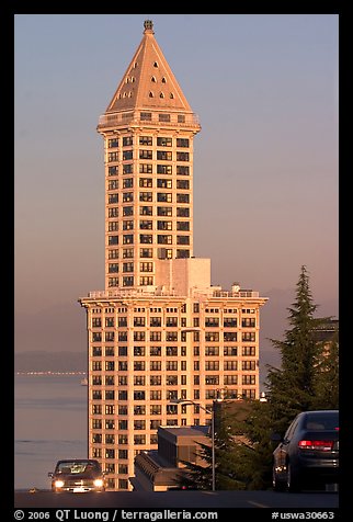 Smith Tower and cars on steep street, early morning. Seattle, Washington (color)