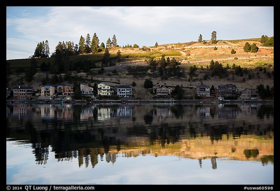 Houses reflected in Lake Chelan. Washington