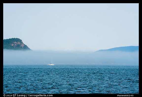 Sailboat and low fog, Salish Sea. Washington (color)