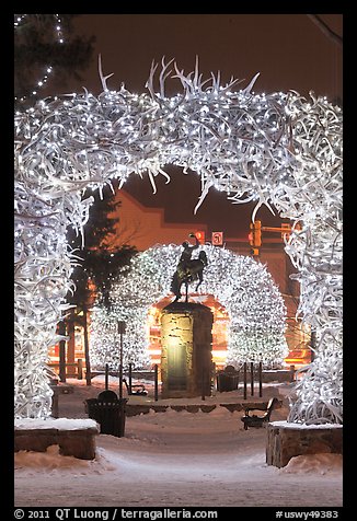 Statue and antler arches by night. Jackson, Wyoming, USA