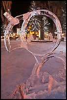 Town square statue framed by ice sculpture. Jackson, Wyoming, USA ( color)