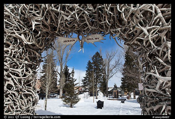 Town Square framed by Antler Arch in winter. Jackson, Wyoming, USA (color)