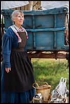 Woman with Pionneer wagon. Fort Laramie National Historical Site, Wyoming, USA ( color)