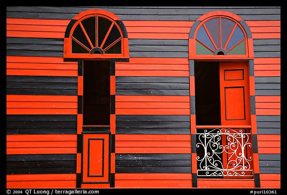 Red window shutters and striped walls, Parc De Bombas, Ponce. Puerto Rico
