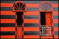 Red window shutters and striped walls, Parc De Bombas, Ponce. Puerto Rico ( color)