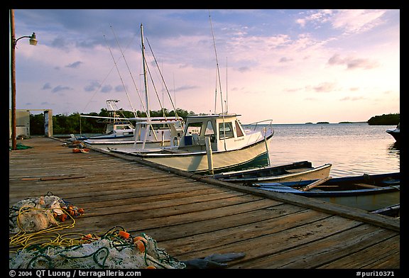 Pier and small boats at sunset, La Parguera. Puerto Rico (color)