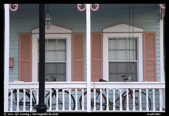 Bicycle on pastel-colored porch. Key West, Florida, USA