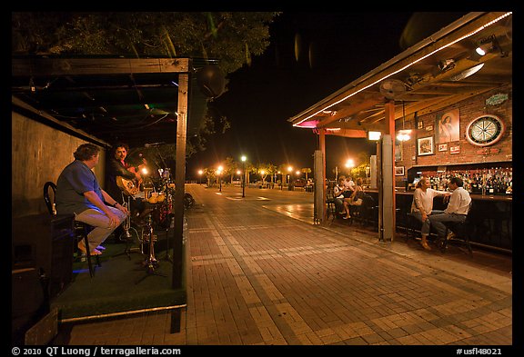 Salsa musicians and bar at night, Mallory Square. Key West, Florida, USA