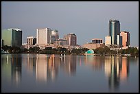 Skyline at dawn from lake Eola. Orlando, Florida, USA ( color)