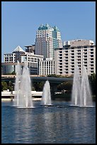 Fountains and downtown high-rises from Lake Lucerne. Orlando, Florida, USA ( color)