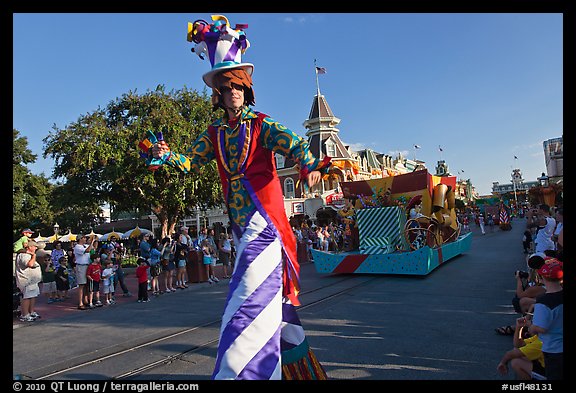 Character on stilts during parade, Main Street. Orlando, Florida, USA (color)