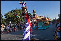 Character on stilts during parade, Main Street. Orlando, Florida, USA