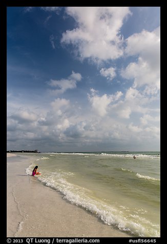 Woman and wave, Fort De Soto beach. Florida, USA