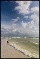 Woman and wave, Fort De Soto beach. Florida, USA ( color)