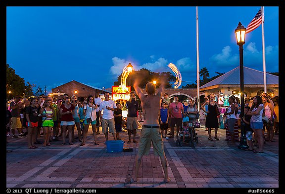 Street entertainer and spectators. Key West, Florida, USA (color)